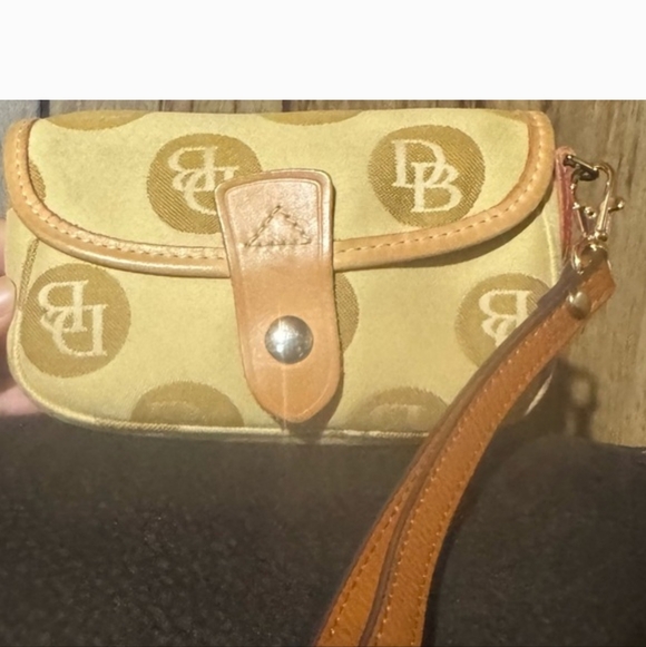 Dooney & Bourke Handbags - Dooney & Bourke Vintage Tan And Brown Logo Wristlet with Leather Trim